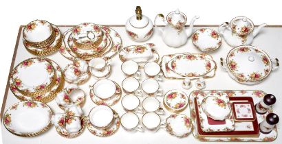 An extensive Royal Albert Old Country Roses pattern dinner service, table mats, table lamp and other