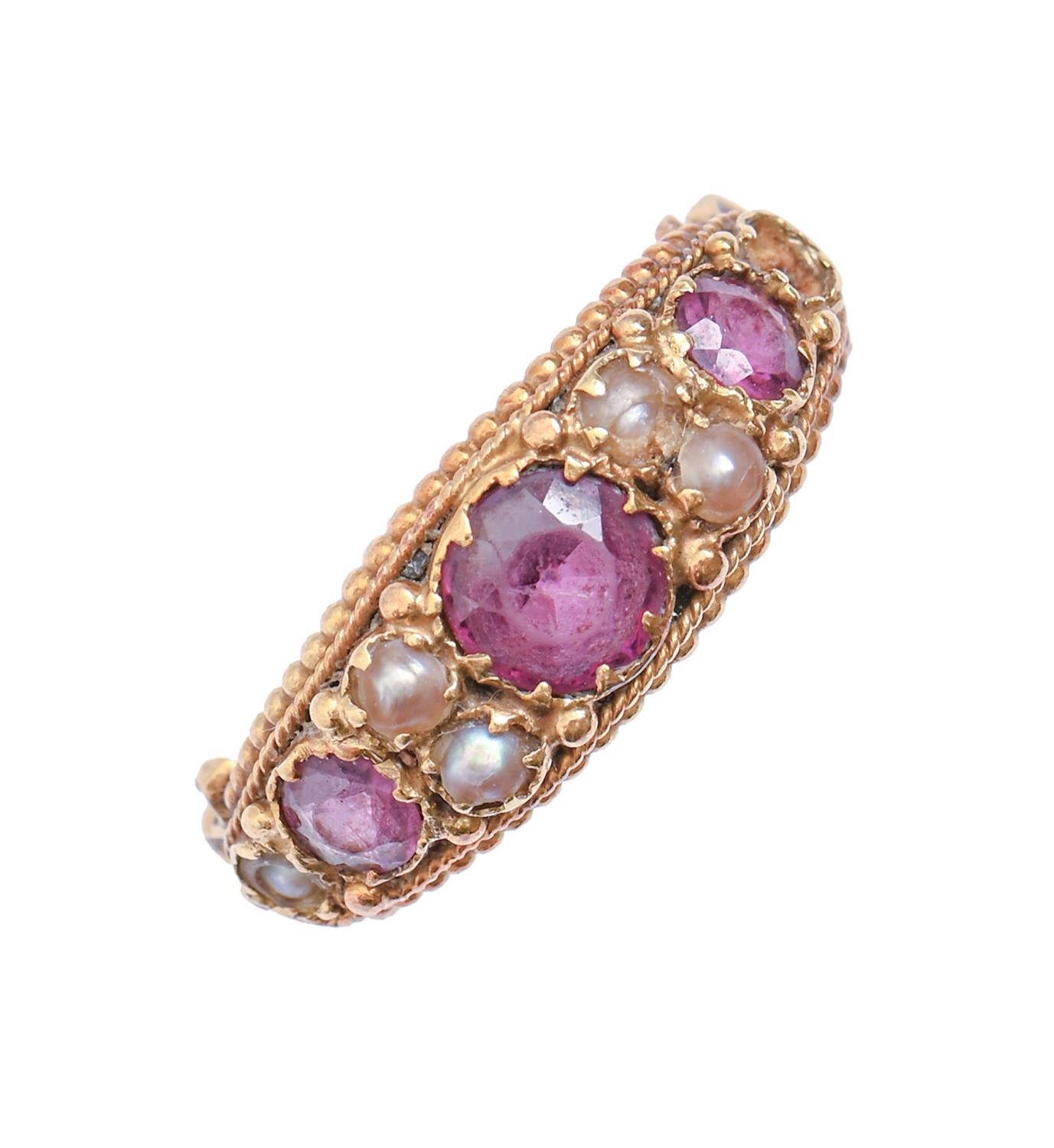 A Victorian ruby and split pearl ring, in gold, 3.3g, size N Lacking one pearl, two of the other