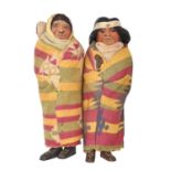 Tribal Art. Two Native American softwood and card Skookum 'Indian' dolls by Mary Francis Woods, 20th