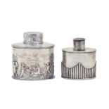 A Victorian oval silver tea caddy and cover, stamped with a continuous bacchanal between reeded
