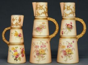 One and a pair of Royal Worcester claret jugs, 1898 and 1908, printed and painted with flowers on