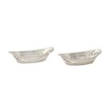 A pair of Victorian pierced oval silver sweetmeat dishes, 14cm l, by James Dixon & Sons, London