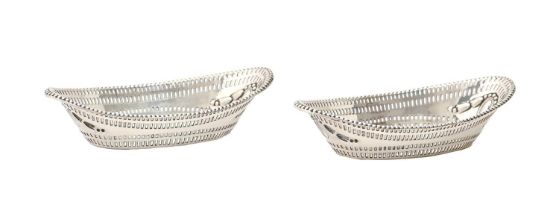 A pair of Victorian pierced oval silver sweetmeat dishes, 14cm l, by James Dixon & Sons, London