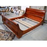A mahogany sleigh bed, 177 cm w Generally good. Some wear.