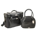 Fashion accessories. An Alexander McQueen for Samsonite Black Label boarding bag and travel bag, the