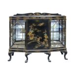 A black japanned breakfront china cabinet, c1930, 137cm h; 149cm l Good condition