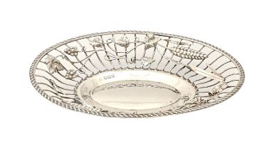 A Victorian oval silver wirework sweetmeat dish,, the border applied with wheat and grapes, in