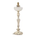 An Edwardian silver oil lamp, in Rococo style, cut glass fount, with plated mounts, 53cm h, by