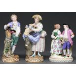 A pair of Meissen figures of a youth and shepherdess, late 19th c and a Meissen group of dancers