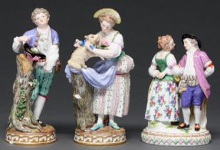 A pair of Meissen figures of a youth and shepherdess, late 19th c and a Meissen group of dancers