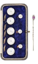 A gold stickpin with pink sapphire and diamond terminal, c1930, terminal 5 x 10mm, 1.5g and a pearl,