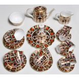 A collection of Crown Derby Imari pattern tea ware, late 20th c, to include six coffee cans and