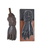 A Victorian cast iron lady's hand door knocker and stud, 14cm, maker's mark, an anchor flanked by CF