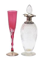 A George V silver mounted cut glass decanter and stopper, 24cm high by James Deakin & Sons,