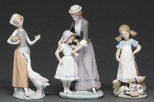 Two Lladro figures and a group, late 20th c, 27cm h and smaller, printed mark Good condition