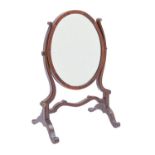 A George III mahogany and line inlaid dressing mirror, the reeded stand retaining two of four