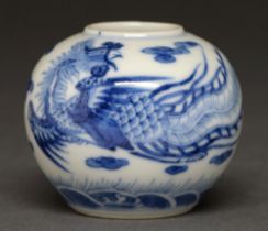 A Chinese blue and white brush pot or jarlet, 19th c, painted with a phoenix, clouds and possibly