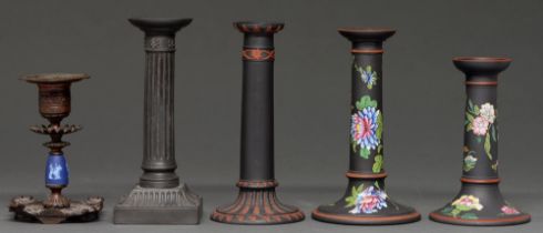 A Wedgwood black basalt candlestick, 19th c, sprigeed in Rosso Antico, 18.5cm h, impressed