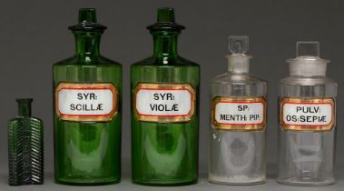 Pharmaceutical glass ware. Two green and two water white chemist's rounds, early 20th c, with gilt