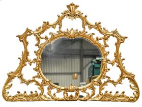 A giltwood over mantle mirror, late 20th c, in Rococo style, 116 x 156cm Good condition