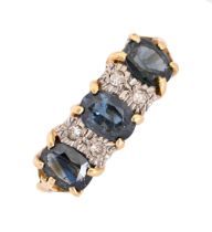 A sapphire and diamond ring, in 18ct gold, London 1965, 3.7g, size M Good condition