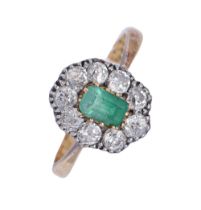 An emerald and diamond ring, the diamond cluster centred by a step cut emerald (5x4mm), gold hoop