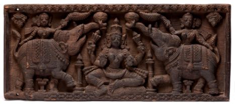 Indian sculpture. A carved wood panel of Gajalakshmi, probably Kerala or Tamil Nadu, 19th c, 22 x