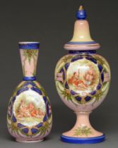 A Bohemian opaque glass pedestal vase and cover, c. 1900, decorated with a bucolic couple, gilt