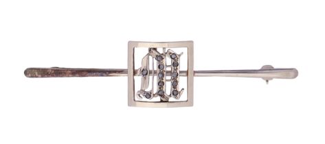 A chip diamond initial M bar brooch, in two colour gold, 59mm l, marked 18ct 9ct, 3.9g Several