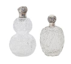 A Victorian silver mounted double gourd shaped cut glass scent bottle and stopper and another in the