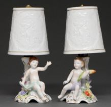 A pair of German porcelain figural lamps and shades, late 20th c, 24cm h