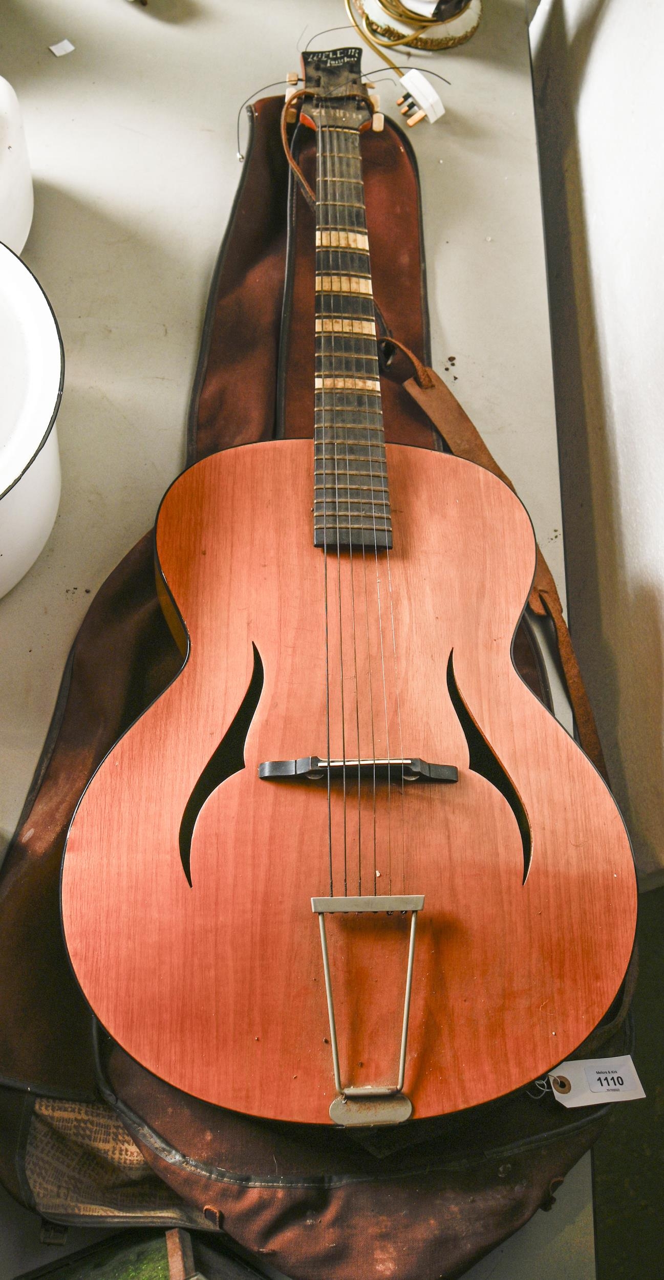 A Zenith acoustic guitar, with soft carry case, 105cm l