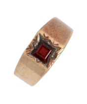 A garnet signet ring, in 9ct gold, marks obscured, 5g, size M Slight wear