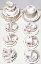 A Royal Albert Lavender Rose pattern tea service, twelve-setting, comprising teacups, saucers and
