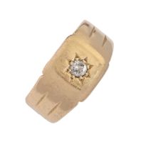 A diamond signet ring, gypsy set in 18ct gold, Birmingham 1926, 6.5g, size P Worn
