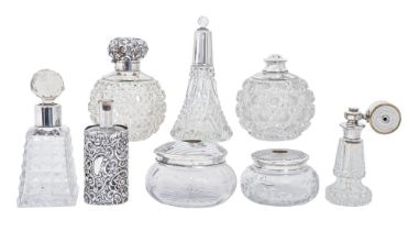 An Edwardian silver mounted globular cut glass scent bottle, 12.5cm h, maker's mark rubbed,