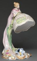 A German porcelain figural standard lamp and shade, late 20th c, in Art Deco style, 40cm h Dirt