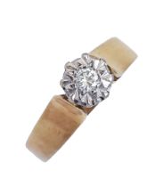 A diamond ring, illusion set in 18ct gold, London 1975, 4g, size K Good condition with much old