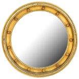 A Victorian circular giltwood mirror, the cavetto frame with balls at intervals, 59cm diam