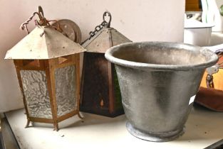 Two brass hexagonal hanging lanterns, early 20th c, one with coloured glass panes, 25cm h and a