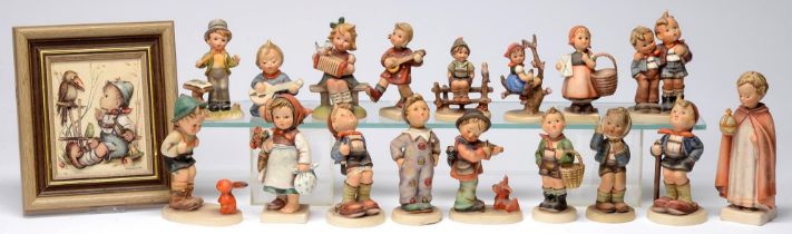 A collection of fifteen miscellaneous Goebel figures of children, some modelled after Hummel,