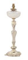 An Edwardian silver oil lamp, in Rococo style, cut glass fount, with plated mounts, 53cm h, by