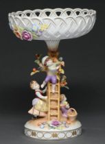 A German porcelain floral encrusted centrepiece, late 20th c, decorated with children picking fruit,
