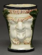 A creamware Janus beaker, 19th c, 90mm h Good condition
