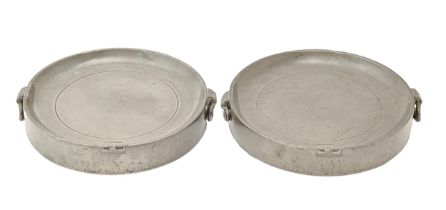 A pair of George III pewter circular warming plates, Samuel Cocks, London, 1819, 20cm diam, touch
