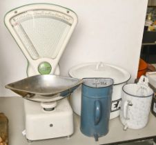 A set of Avery countertop grocer scales, an enamelled breadbin, measuring jug, etc