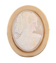 A cameo brooch, the oval shell carved with the head of a woman, plain gold mount, 50mm, maker's