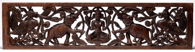 Indian sculpture. A carved and pierced wood panel or door lintel of Gajalakshmi, Kerala, 19th / 20th