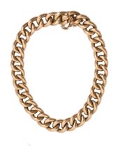 A gold curb bracelet, early 20th c, 18cm, marked 9c, 12.8g Light wear