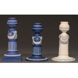 A Wedgwood blue jasper Corinthian candlestick, 19th c, 15.5cm h, impressed WEDGWOOD, another two,